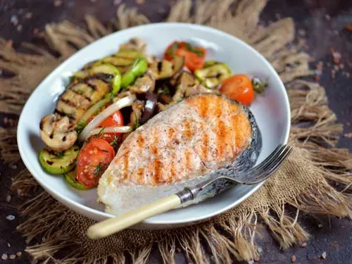 Grilled sturgeon with vegetables