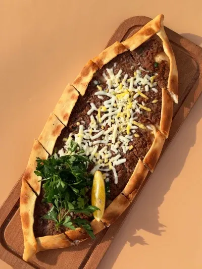 Pile with minced meat and cheese