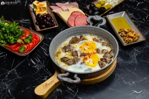 Eggs with fried meat