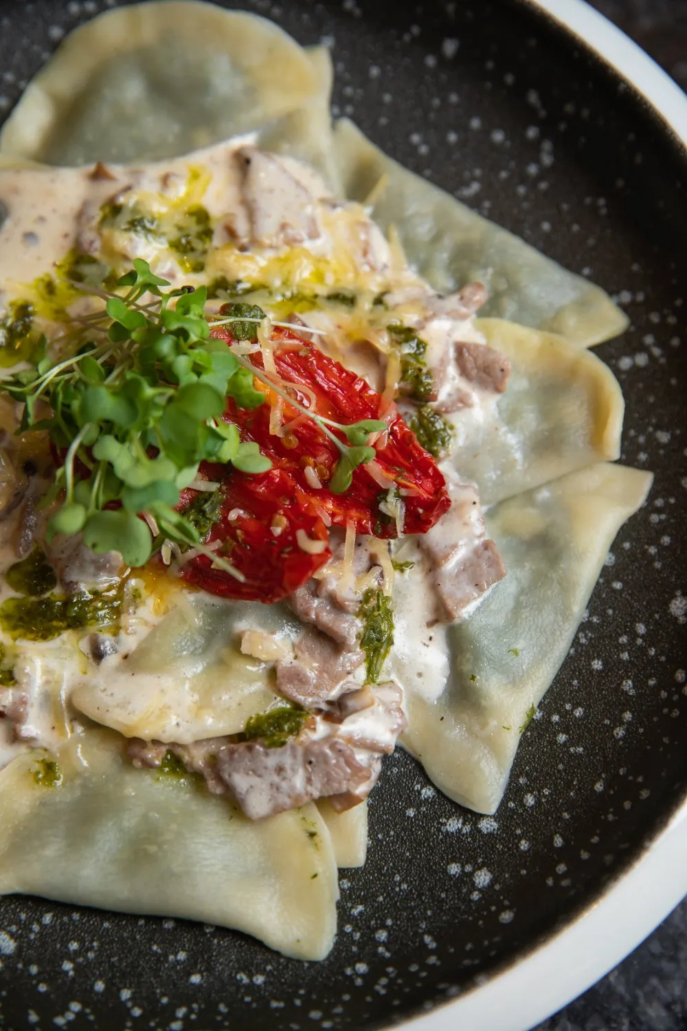 Ravioli with creamy topping